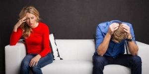 A distressed couple experiencing tension, symbolic of the turmoil caused by an affair